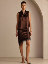 [Bitter Chocolate] Dark brown sleeveless tie-neck top on a model in a full-body front view with arms relaxed and feet close together. 007