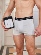 [Gray] White mulberry silk boxer briefs set with black SILK waistband, worn by male model 001