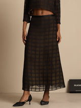 Black silk high-waist A-line midi skirt with textured grid pattern