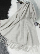 [Light Gray] light gray rectangular shawl with fringed edges, flat lay, loosely coiled to show the fringe and full color. 006