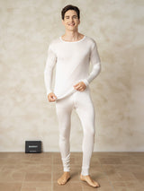 [White] Model wearing white men's silk jersey long johns with crew neck top and fitted leggings 001