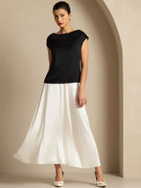 [Black] Model wearing black silk cap sleeve cowl neck top with white midi skirt 006