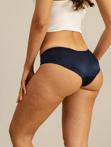 [Dark Blue] Woman wearing navy silk bikini panties, back view 002