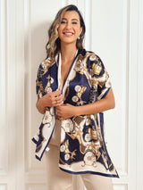 [P026] Woman wearing a navy and ivory mulberry silk printed carriage shawl scarf