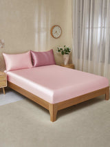 [PaleMauve+LightPink] Pink silk fitted sheet with two matching pillowcases on wooden bed frame 001