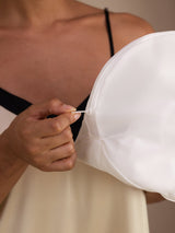 White mesh laundry wash bag with zipper closure for delicate garment care