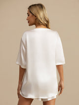 [White] Back view of woman wearing white 100% mulberry silk oversized short sleeve sleep tee 002