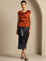 [Caramel] Woman wearing rust silk cap sleeve cowl neck top with relaxed fit 007