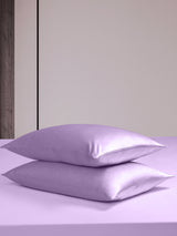 [Lavender] Lavender silk pillowcases stacked on bed, smooth 19 momme mulberry silk 004