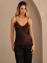[Brown] Brown lace-trim V-neck camisole top on a model in a mid-length front view with arms relaxed and shoulders square. 001