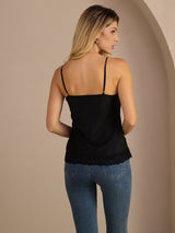 [Black] Mid-length back studio view of a model wearing black lace-trim spaghetti-strap camisole. 002