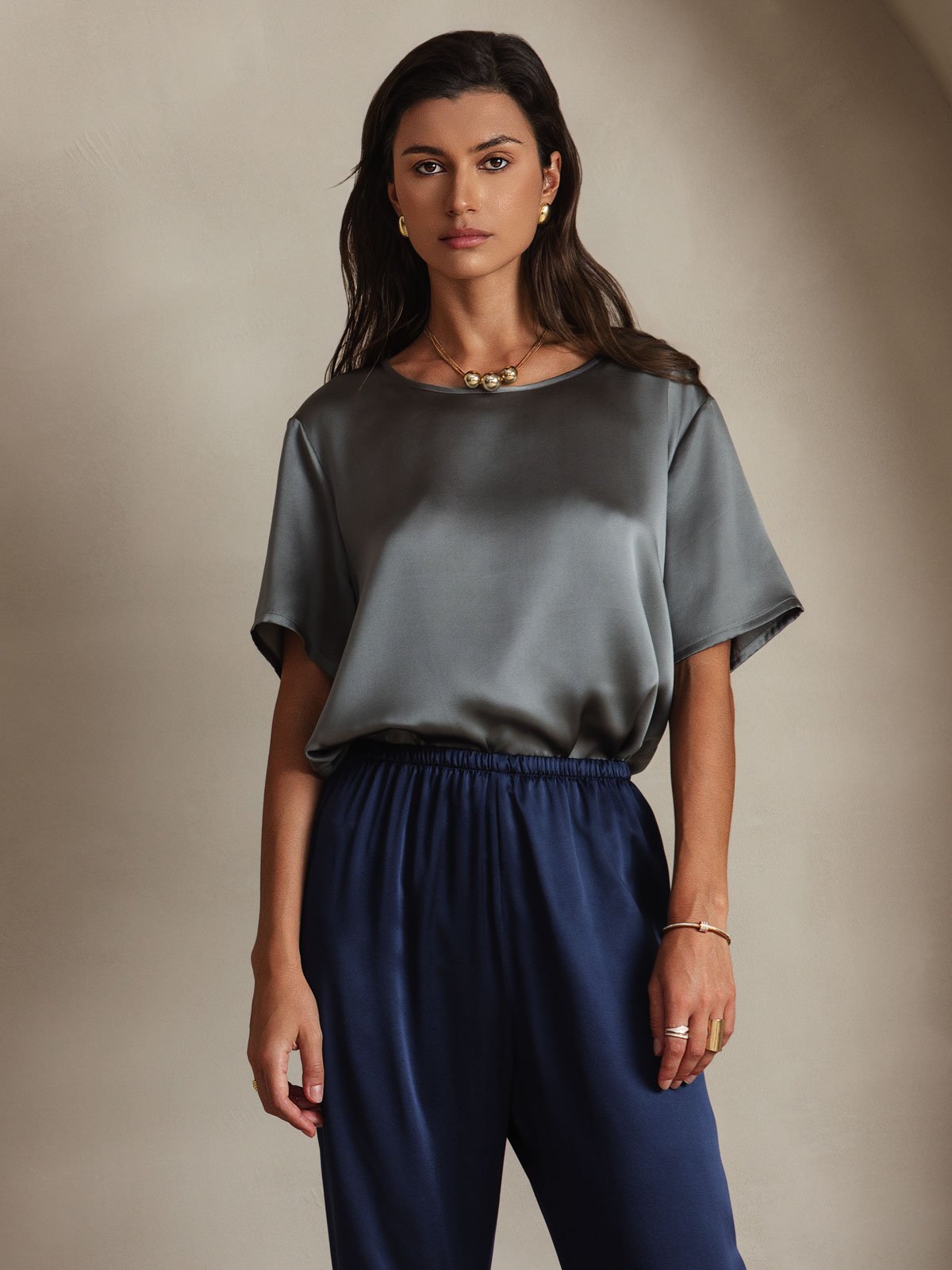 [Dark Gray] Women’s gray silk short sleeve round neck T-shirt styled with navy pants 001