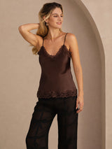 [Brown] Brown lace-trim camisole in a front thigh crop, with one hand raised behind her hair. 003