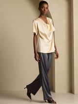 [Champagne] Cream silk cowl neck short sleeve top with loose fit and draped neckline on model 007