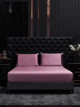[Pale Mauve] Pink silk fitted sheet set with two matching pillowcases on a black bed 002