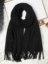 [Black] Flat-lay view of a rectangular wool shawl with fringed edges, 200 by 70 cm, in black 005