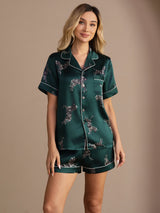 [Emerald Zebra] emerald green animal-print short pajama set with contrast piping, full front view, model with both arms relaxed. 001