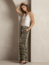 [Leopard] Model wearing leopard print silk wide-leg pants with side pockets and white sleeveless top 003