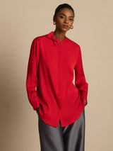 [Wine] Red long-sleeve collared blouse with gray wide-leg trousers in a front crop to thighs, both hands tucked into pockets. 001