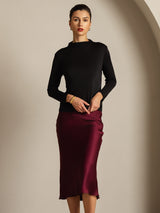 [Black] Model wearing black mulberry silk long sleeve mock neck top with burgundy silk skirt 007