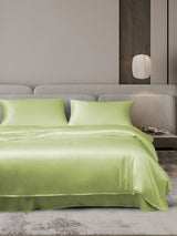 [Mint Green] Lime green silk duvet cover set with matching pillowcases on modern bed 001