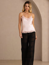 [Pink] Pale pink lace-trim V-neck camisole top on a model in a full-body front view with arms relaxed and feet close together. 007