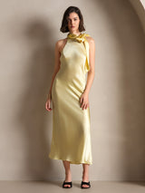 [Light Yellow] The model faces forward in a head-to-toe view of pale yellow scarf-neck maxi dress, with the full hemline in frame. 005