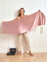 [Pale Mauve] Woman holding a pink mulberry silk rectangle scarf shawl, glossy and lightweight 009