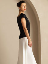 [Black] Women’s silk cap sleeve cowl neck top in black, styled with white skirt 002