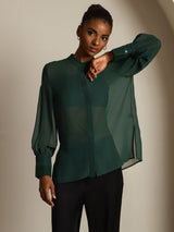 Dark green sheer long sleeve silk blouse with button cuffs and side slit