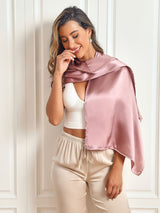 [Pale Mauve] Pink silk rectangular scarf shawl draped over a woman with a white top and beige pants 008