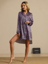 [Purple Leopard] Framed from the front to mid length, purple leopard-print shirt dress is shown with one arm lifted at the side. 001