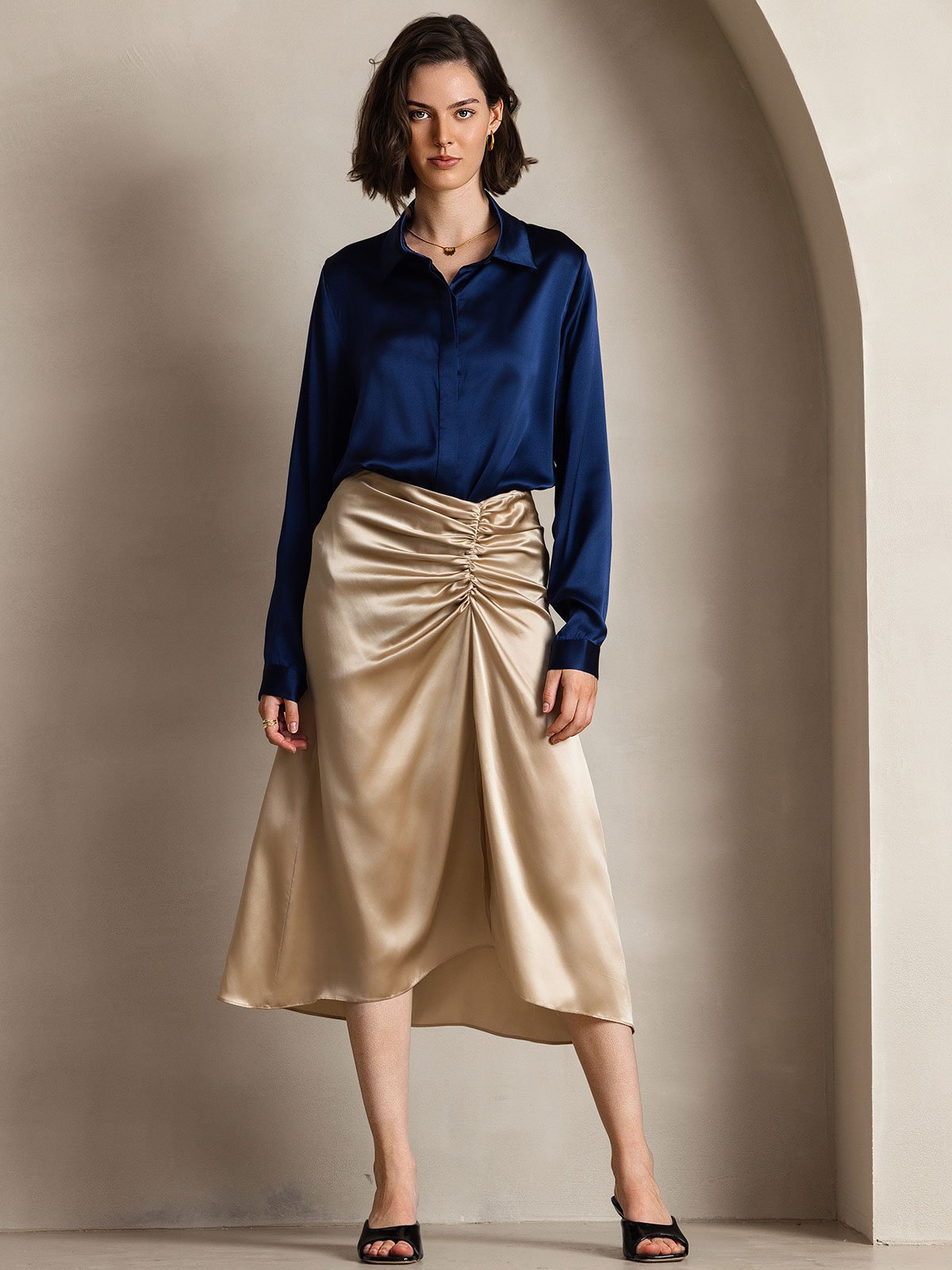 [Dark Blue] Navy blue women's long-sleeve button-front shirt with pointed collar, full front view, model with both arms relaxed. 001