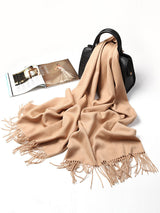[Tan] tan beige rectangular shawl with fringed edges, flat lay, loosely draped beside a handbag and small accessories. 005