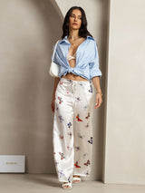 [White Butterfly] White 19Momme silk butterfly print wide-leg pants with drawstring waist on model 006