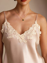 [Pink] Neckline detail of a pale blush pink silk camisole with spaghetti straps and floral lace at the V neckline 004