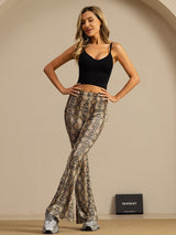 [Snakeskin] Side-angled view: high-rise flared trousers with a gray-brown snakeskin print, with the model partly turned. 002