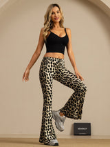 [Leopard] Turned studio view: high-rise flared trousers with a black-and-cream leopard print, with the side line visible. 002