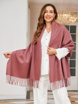 [Pale Mauve] pale mauve rectangular shawl with fringed edges, styled front view, one side extended outward to show the width. 001