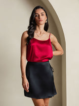 [Black] Black silk A-line mini skirt with tie waist, styled with red camisole 005