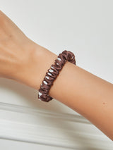 [Coffee] Brown printed 100% mulberry silk skinny hair scrunchie worn on wrist 001