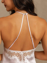 [Lavender] Close rear view of a lavender halter camisole, showing adjustable straps and white lace across the low back. 006