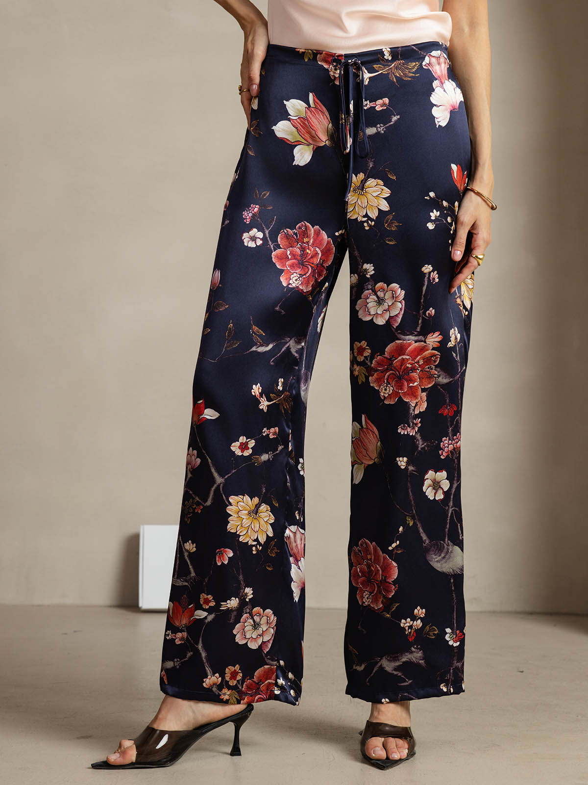 [Navy Floral] Navy floral silk wide leg pants with drawstring waist on model 001
