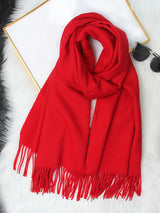 [Red] bright red rectangular shawl with fringed edges, flat lay, loosely coiled to show the fringe and full color. 004