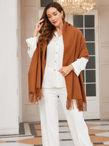 [Brown] warm brown rectangular shawl with fringed edges, styled front view, fringed ends down the front. 002