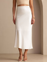 [Ivory] Ivory glossy maxi skirt on a model in a waist-to-ankle front crop with both legs straight and close together. 003