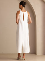 [White] Full-length back view of a mulberry silk sleeveless scoop-neck midi dress with gathered waist and side pockets in white 002