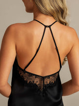 [Black] Close rear view of a black halter camisole, showing adjustable straps and black lace across the low back. 005