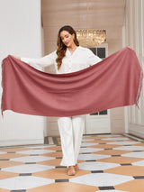 [Pale Mauve] Front view of the product held open: a rectangular wool shawl with fringed edges, 200 by 70 cm, in pale mauve 004