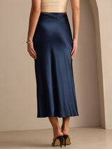 [Dark Blue] Navy blue glossy maxi skirt on a model in a straight rear waist-to-ankle crop with arms down and heels close. 002